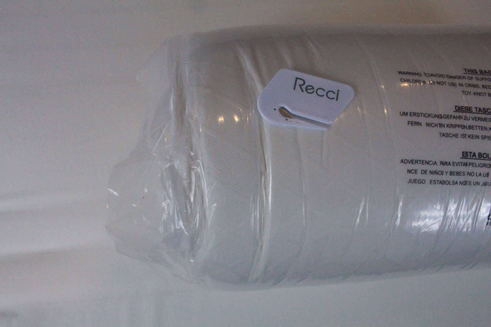 Recci Matratzen Topper eingerollt in Plastik